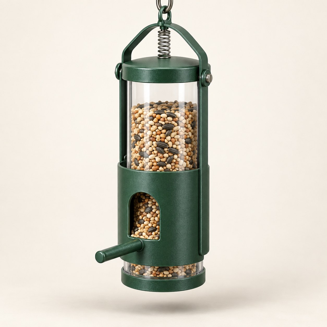 Concept illustration of a feeder with a spring and movable outer shroud